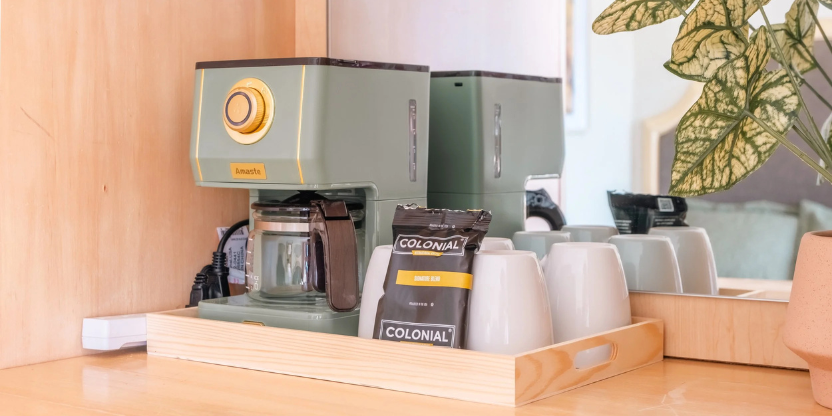 In-room coffee amenities provided at a comfortable local hotel.